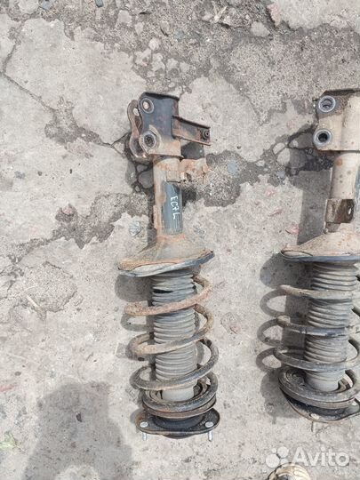 Передняя левая стойка Geely Emgrand EC7