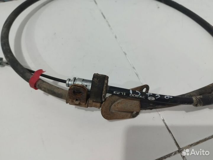 Трос стояночного тормоза левый Sportage 3