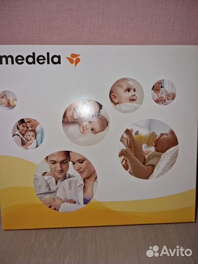 Молокоотсос medela электрический