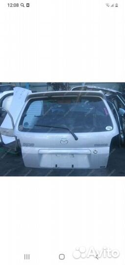 Стекло двери багажника mazda demio DW3W 2000г