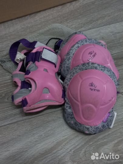 Роликовые коньки