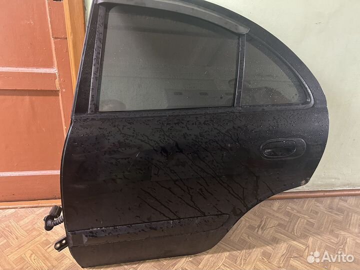 Дверь задняя левая Nissan almera classic B10