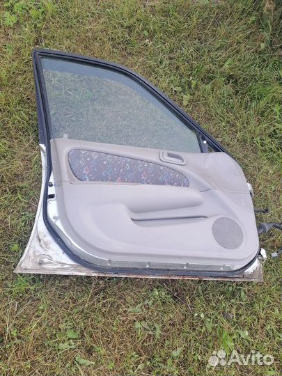 Двери toyota corolla 110