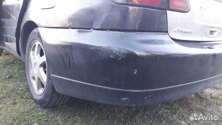 Бампер задний Nissan primera p11