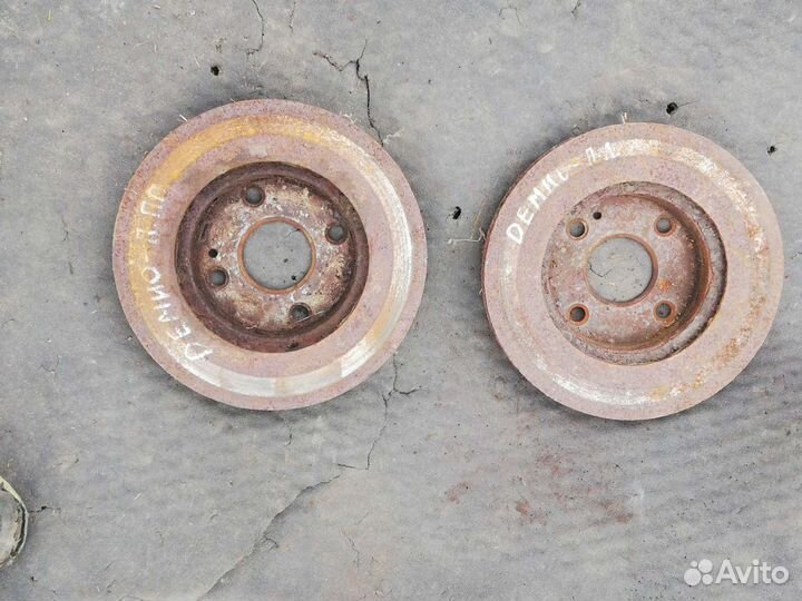 Тормозной диск Мазда Демио 1