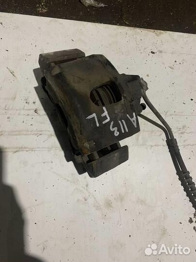 Суппорт передний левый dodge Grand Caravan 2001-2