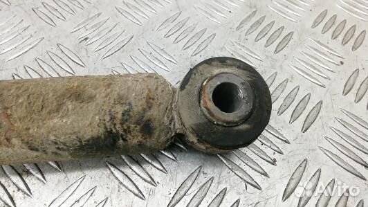 Амортизатор задней балки nissan note E11 (4BN23LX0