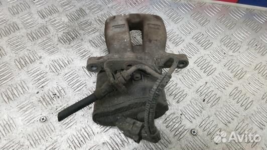 Суппорт тормозной задний левый volkswagen passat B