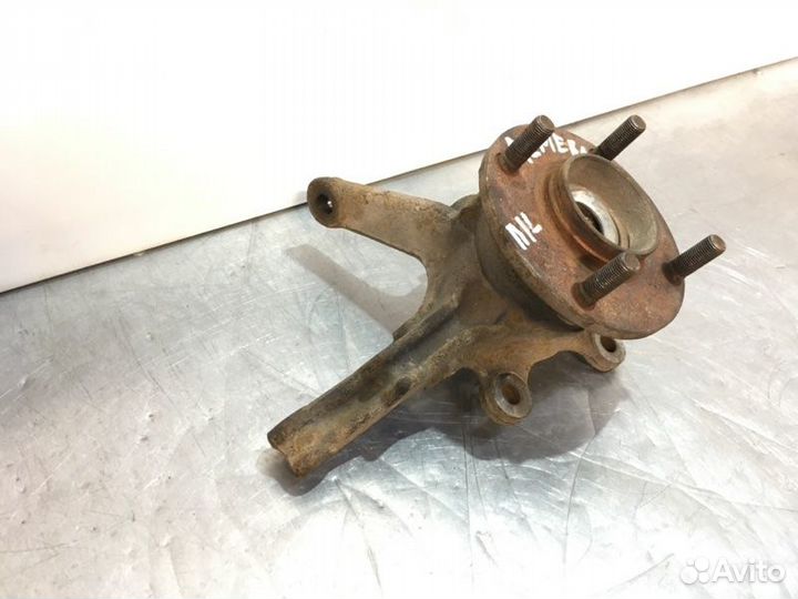 Кулак поворотный передний левый Nissan Almera N16