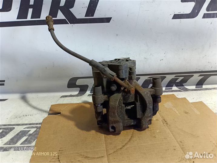 Суппорт тормозной задний правый Skoda Superb III