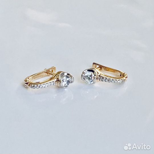 Золотые серьги с камнем