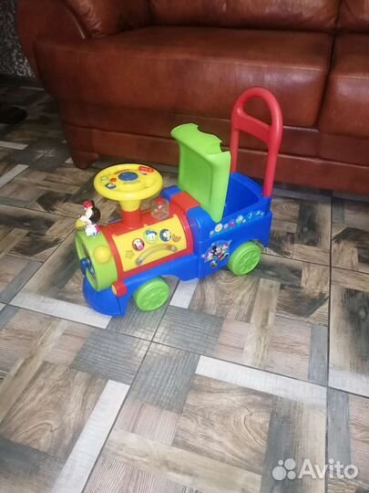 Паровозик каталка развивающий Disney