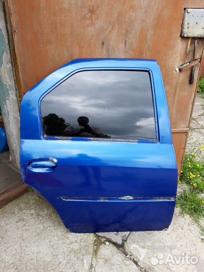Дверь задняя правая renault logan 1
