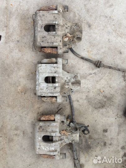 Суппорт задний Мазда 3