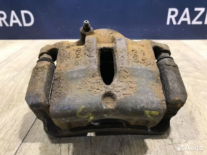 Суппорт передний правый Kia Sportage 3 2.0 G4KD