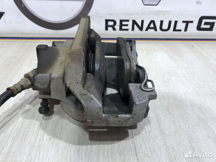 Суппорт тормозной перед Renault megane 2 Лев