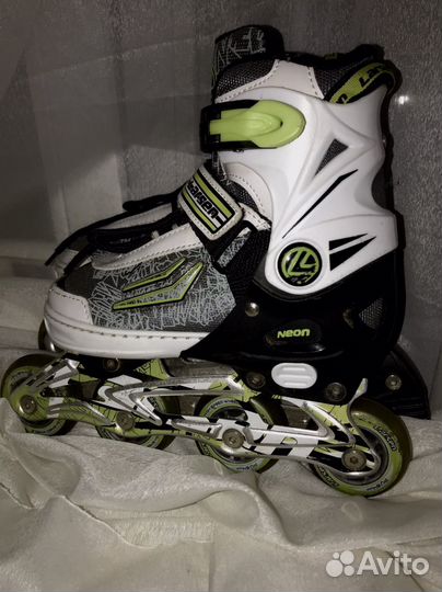 Роликовые коньки