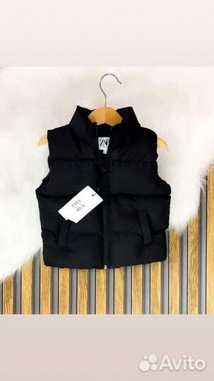 Жилетка черная