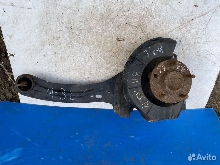 Mazda 3 BK задний левый рычаг(кулак)