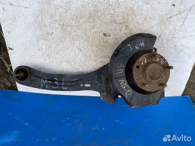 Mazda 3 BK задний левый рычаг(кулак)