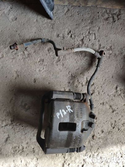 Nissan primera p12 суппорт передний со шлангом