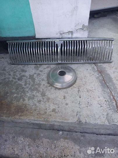Решетка радиатора и колпак