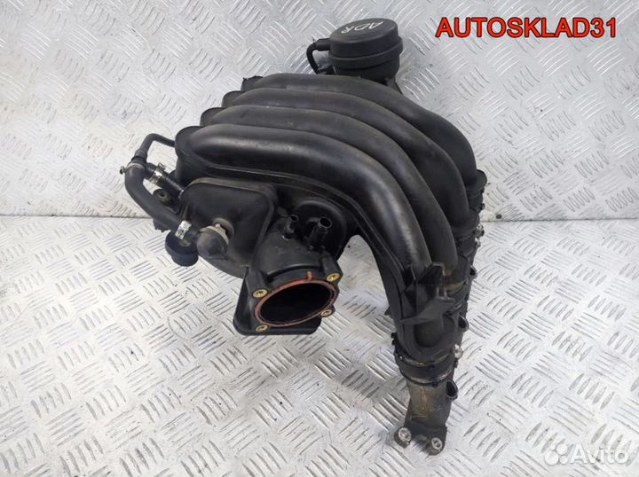 Коллектор впускной VW Passat B5 1,8 ADR 06B133210M