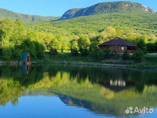 Беседка с мангалом у подножия мистической горы