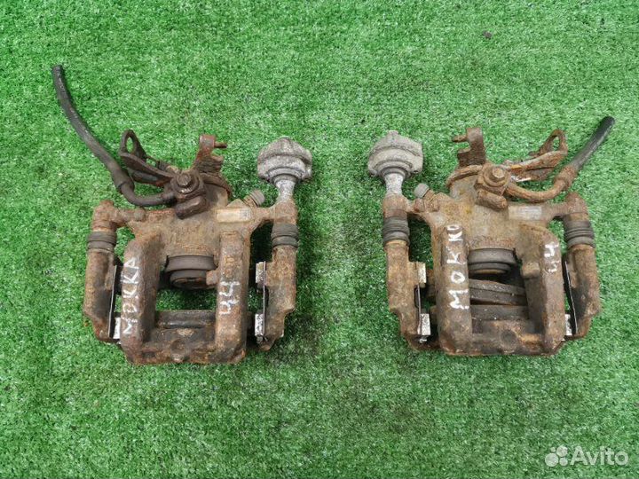 Суппорт тормозной задний Opel Mokka 1.6 A16XER