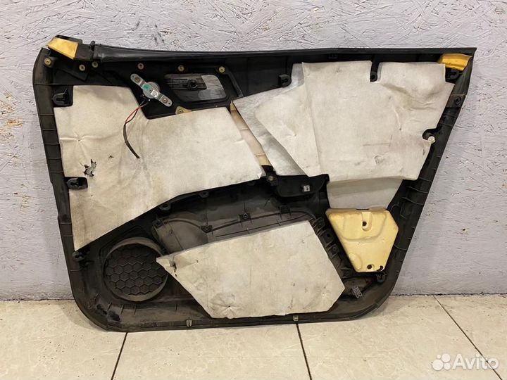 Обшивка двери передняя левая Geely Emgrand EC7