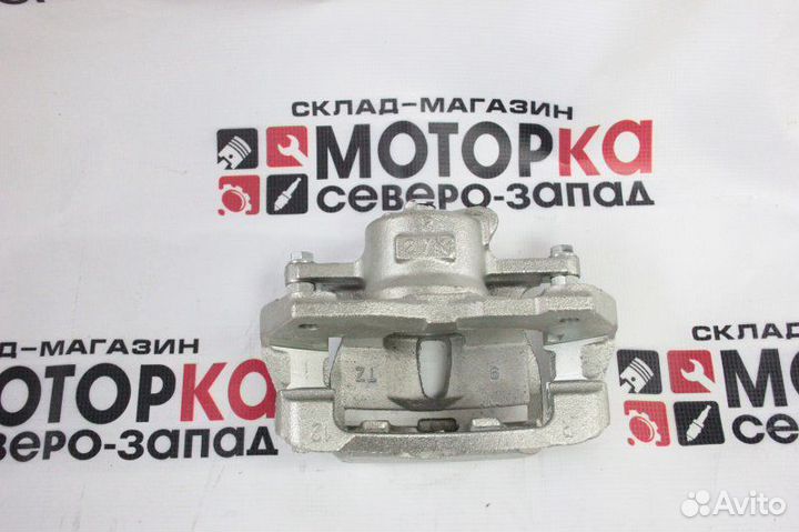 Суппорт тормозной передний правый Toyota Corolla