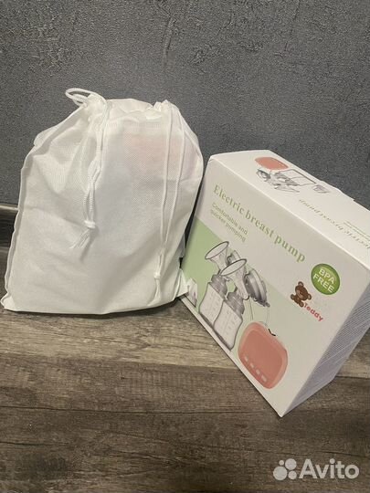 Молокоотсос электрический новый