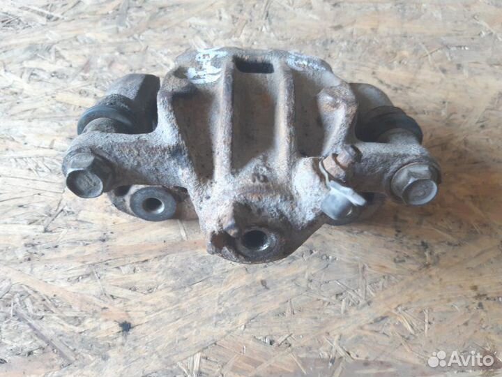 Суппорт задний левый Hyundai Elantra 2006-2011