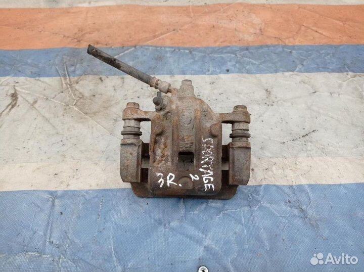 Суппорт тормозной задний правый Kia Sportаge Ii