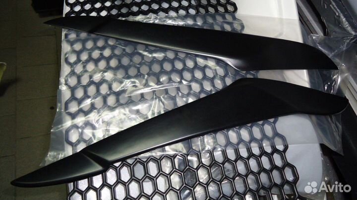 Реснички (накладки) на фары BMW X5E70