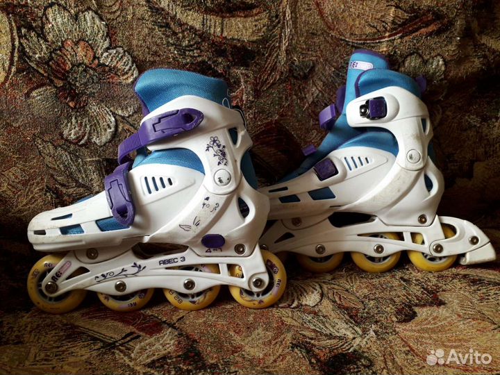 Роликовые коньки