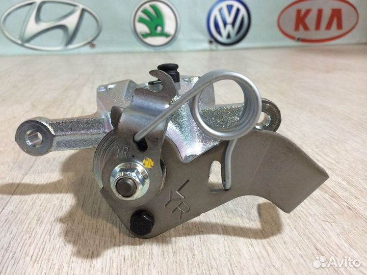 Суппорт задний левый оригинал новый Солярис Рио 3