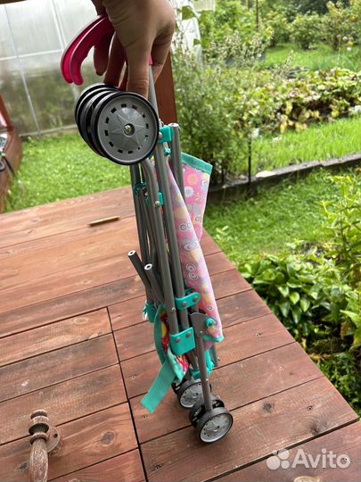 Коляска кукольная с пупсом