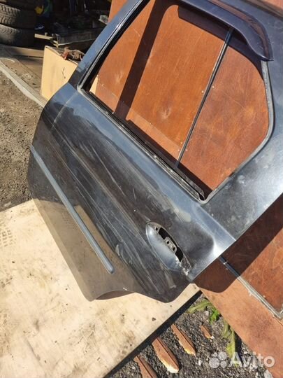 Задняя левая дверь Renault Logan