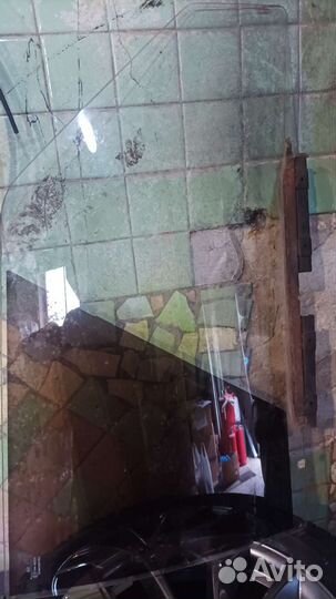 Стекло двери таврия