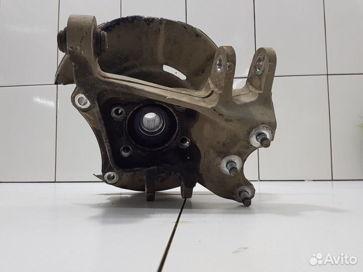 Кулак поворотный задний левый