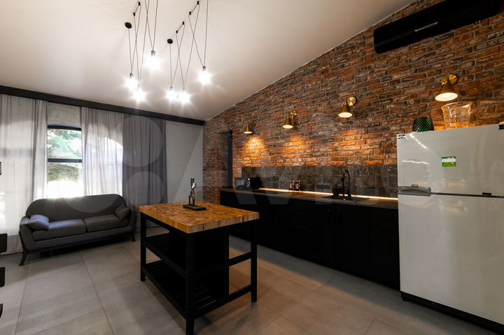 Коттедж 385 м² на участке 15 сот.