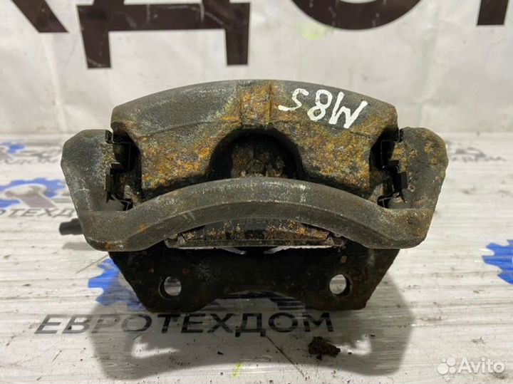 Суппорт передний правый Nissan Primera P12 QG18DE