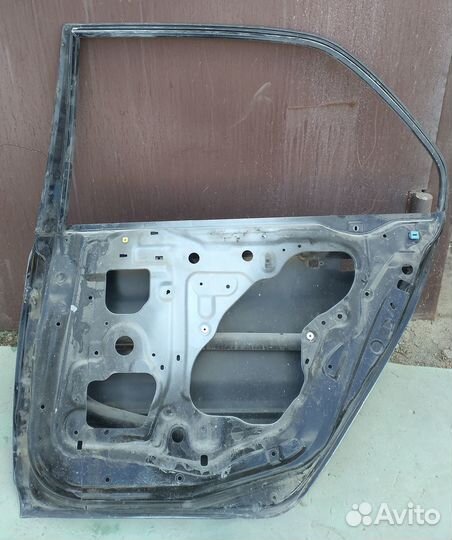 Дверь задняя правая lancer 9