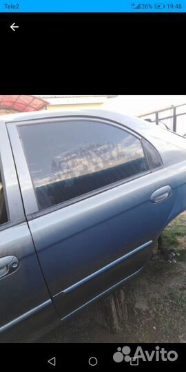 Задняя левая дверь в сборе на Kia Shuma/Спектра