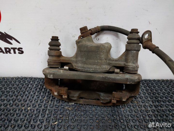 Суппорт тормозной передний правый Toyota Corsa