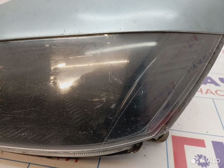 Фара левая Mitsubishi Lancer (CS) MN161675