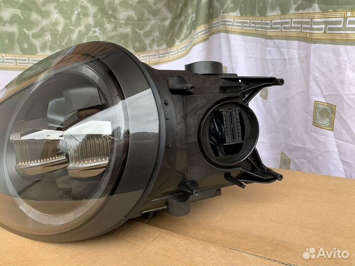 Фара правая Porsche 911 99163196463