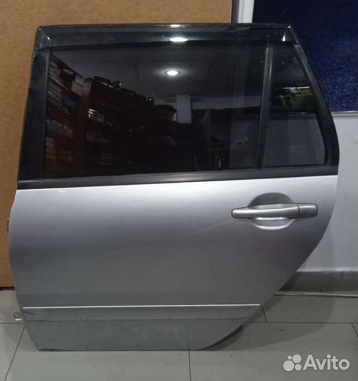 Дверь задняя левая Лансер 9 универсал