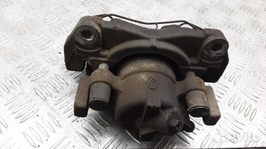 Суппорт тормозной передний левый renault laguna 3